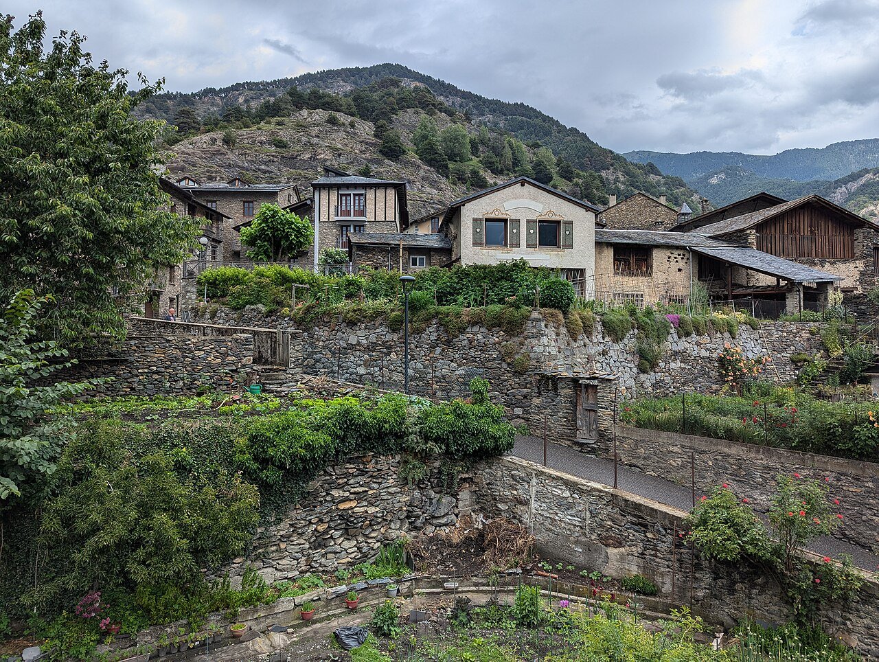 Stone houses, terraced gardens and slate roofs around Carrer Major in Ordino, Andorra's prettiest village core