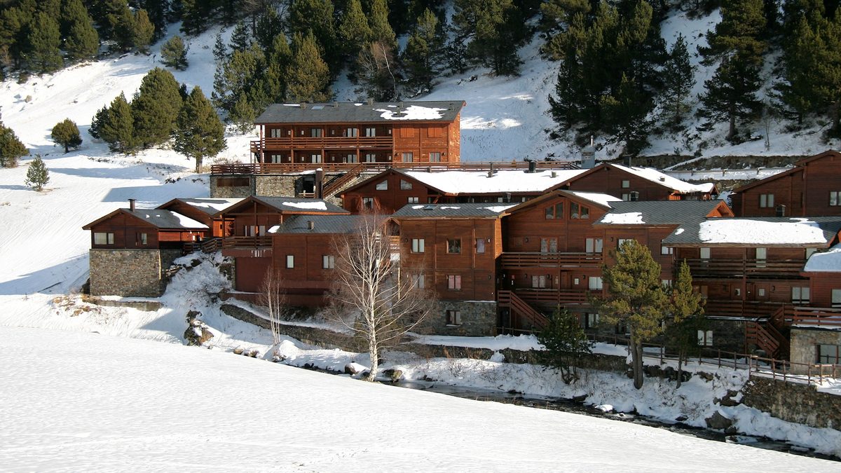 Snow-covered chalets in the Vall d'Incles, a classic Andorran winter scene