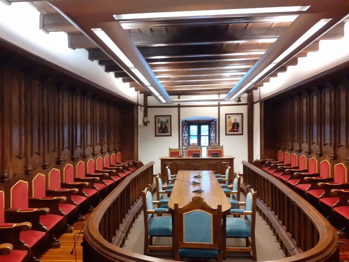 The Sala del Consell chamber inside Casa de la Vall, hung with portraits of Andorra's two Co-princes