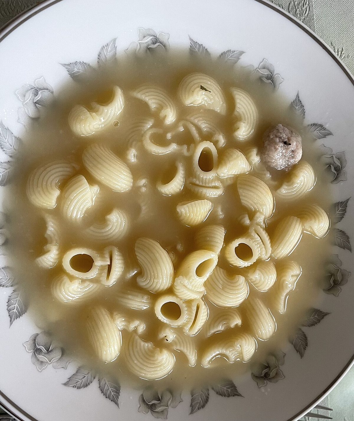 A bowl of escudella with galets pasta, the Christmas stew eaten across Andorra and Catalonia